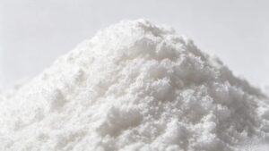 L-Glutamine white crystalline powder in petri dish, food and pharma grade amino acid raw material CAS 56-85-9