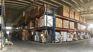Large bulk warehouse storage of BCAA 25kg fiber drums, stable factory supply for global supplement importers