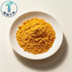 Top-down shot of bright orange-yellow Riboflavin-5'-Phosphate Sodium Salt Dihydrate FMN-Na fine powder on clean white paper, detailed texture of vitamin B2 coenzyme raw material for pharmaceutical export